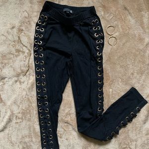 Gold lace up black leggings